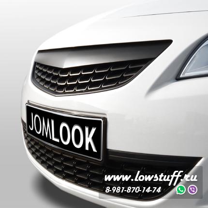 Opel Astra J 5-дв решетка радиатора тюнинг черная без значка Jom 6320069OE